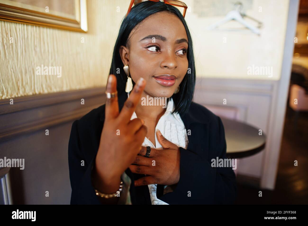 Young deaf mute african american woman using sign language Stock Photo