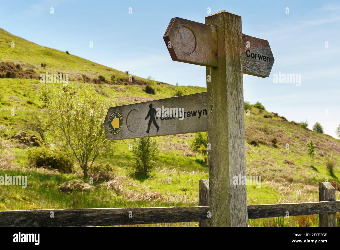 Sign post erected by Denbighshire council pointing to the Dee Valley Way and Caer Drewyn an iron age hill fort Corwen North Wales dated to 500 BC Stock Photo