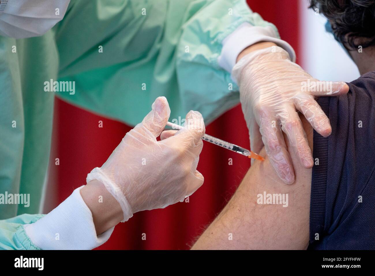 First anticovid-19 vaccination ( Cominarty Pfizer BioNTech vaccine ) at an EHPAD on January 8, 2021, France. Stock Photo