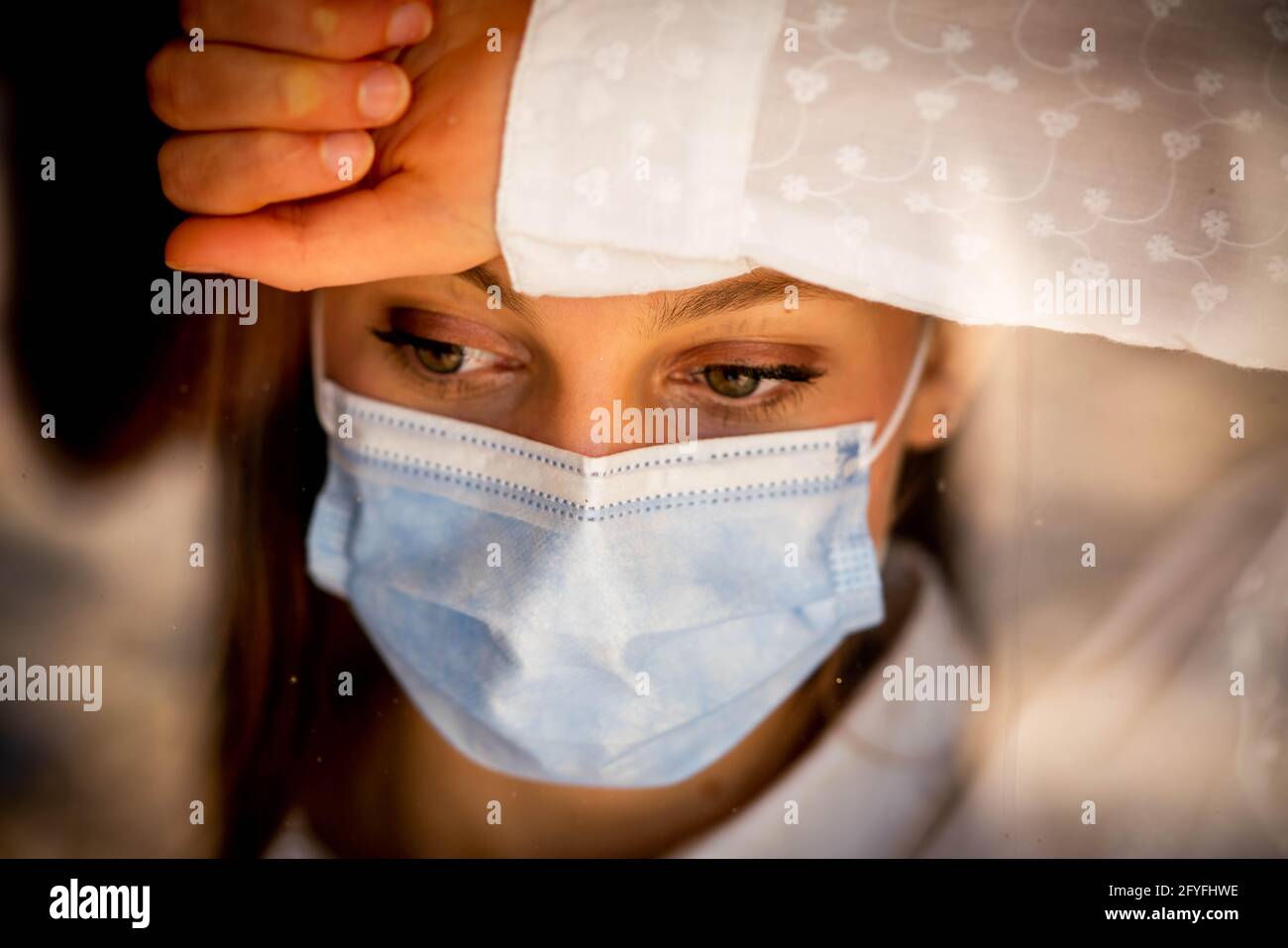 Woman wearing a surgical mask Stock Photo Alamy