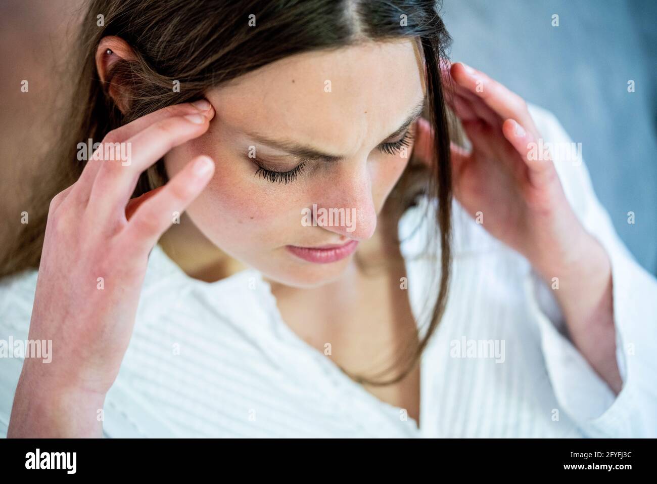 Woman suffering from headache. Stock Photo