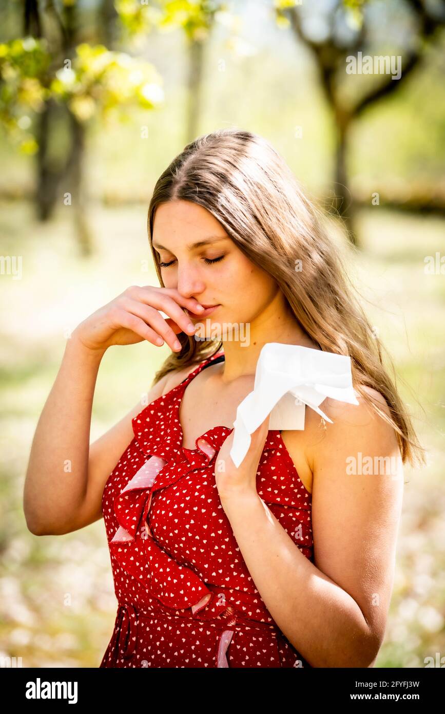 Woman suffering from allergic rhinitis. Stock Photo