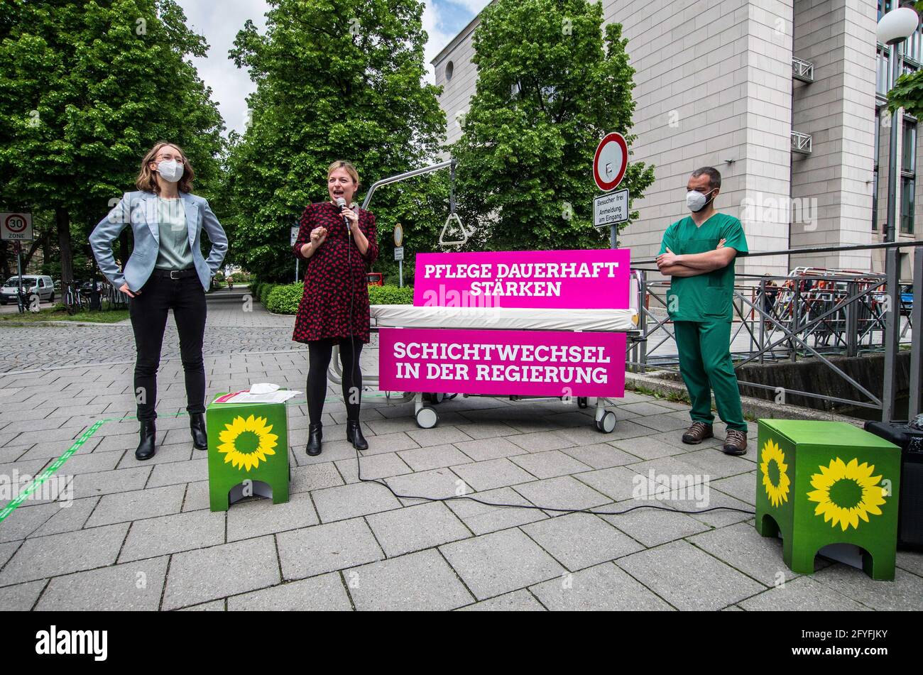May 28, 2021, Munich, Bavaria, Germany: EVA LETTENBAUER, KATHARINA SCHULZE, and ANDREAS KAHL of the Bavarian Greens. The Bavarian Greens (die Gruenen/Buendnis90) organized a protest action at the Bavarian Staatskanzlei (government building) in support of healthcare workers. During the Coronavirus crisis, the working conditions for this sector have come into greater focus and The Greens are pushing for better politics for this sector where pay structures and working conditions are improved and there exists a pathway for communication between the workers and political structures. (Credit Image Stock Photo