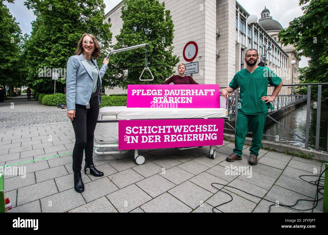 May 28, 2021, Munich, Bavaria, Germany: EVA LETTENBAUER, KATHARINA SCHULZE, and ANDREAS KAHL of the Bavarian Greens. The Bavarian Greens (die Gruenen/Buendnis90) organized a protest action at the Bavarian Staatskanzlei (government building) in support of healthcare workers. During the Coronavirus crisis, the working conditions for this sector have come into greater focus and The Greens are pushing for better politics for this sector where pay structures and working conditions are improved and there exists a pathway for communication between the workers and political structures. (Credit Image Stock Photo