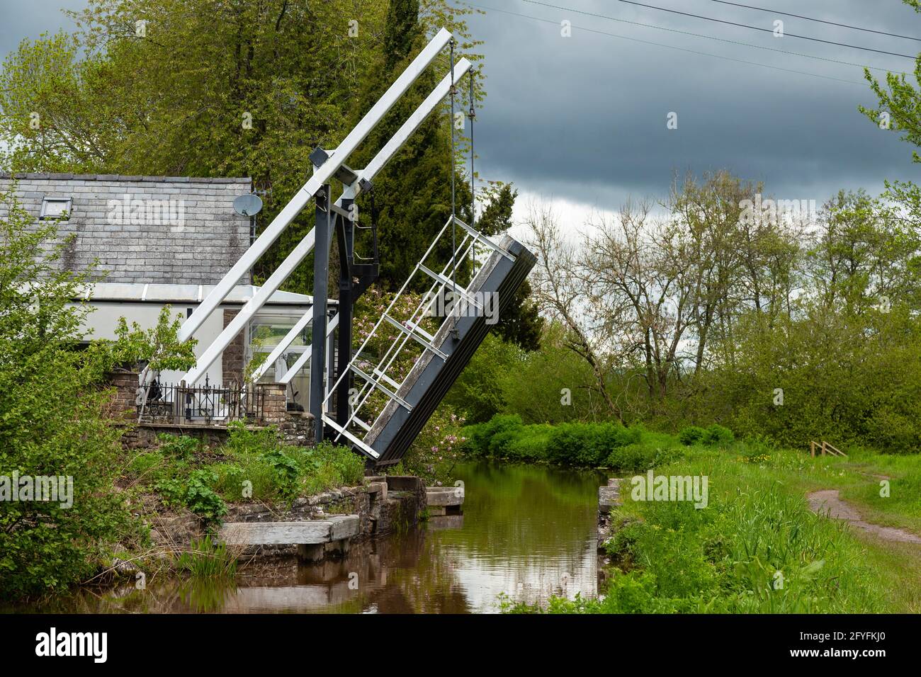 Lift bridge in raised position, Monmouthshire and Brecon Canal, Powys, Wales, UK Stock Photo