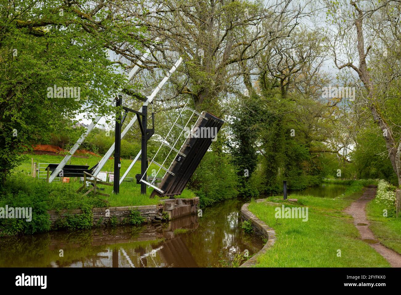 Lift bridge in raised position, Monmouthshire and Brecon Canal, Powys, Wales, UK Stock Photo
