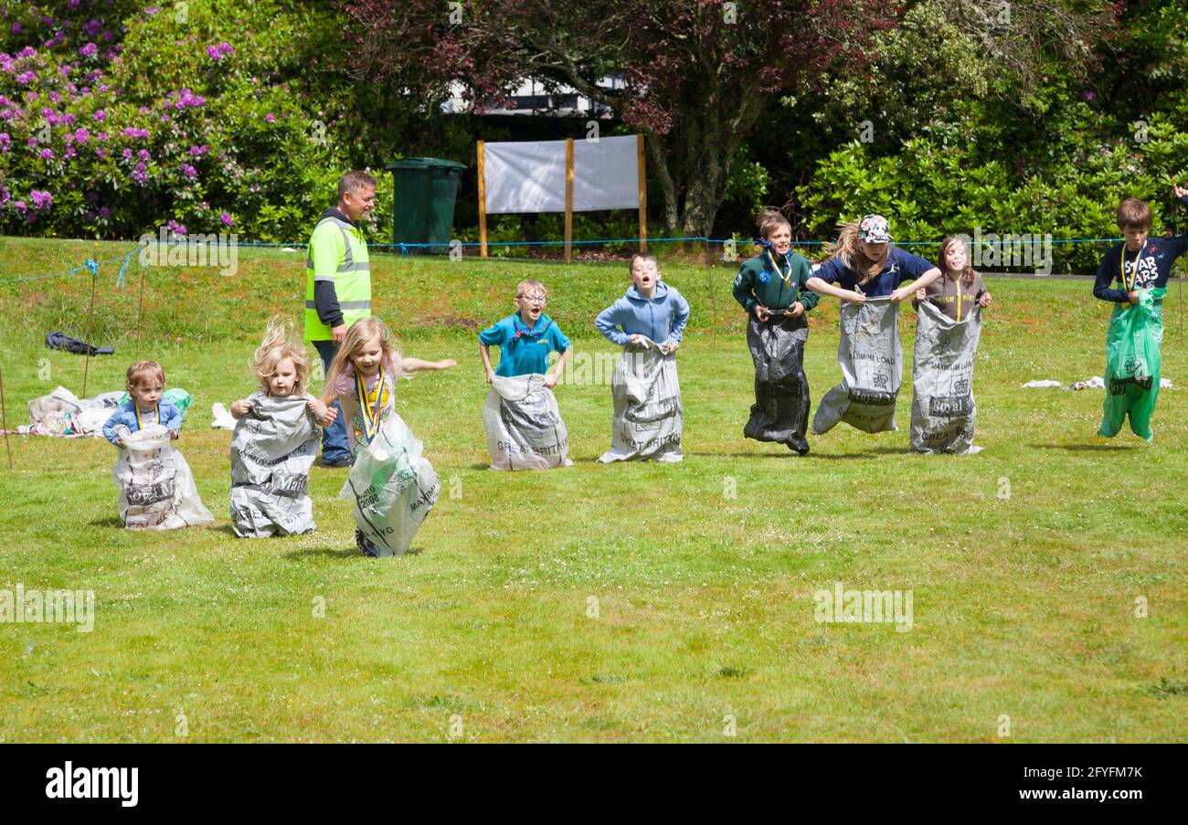Sack race and children sports at Rhu Gala, Argyll, Scotland Stock Photo