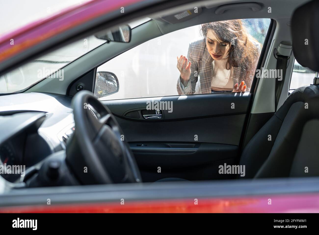 Woman Forgot Her Key Inside Locked Car Stock Photo