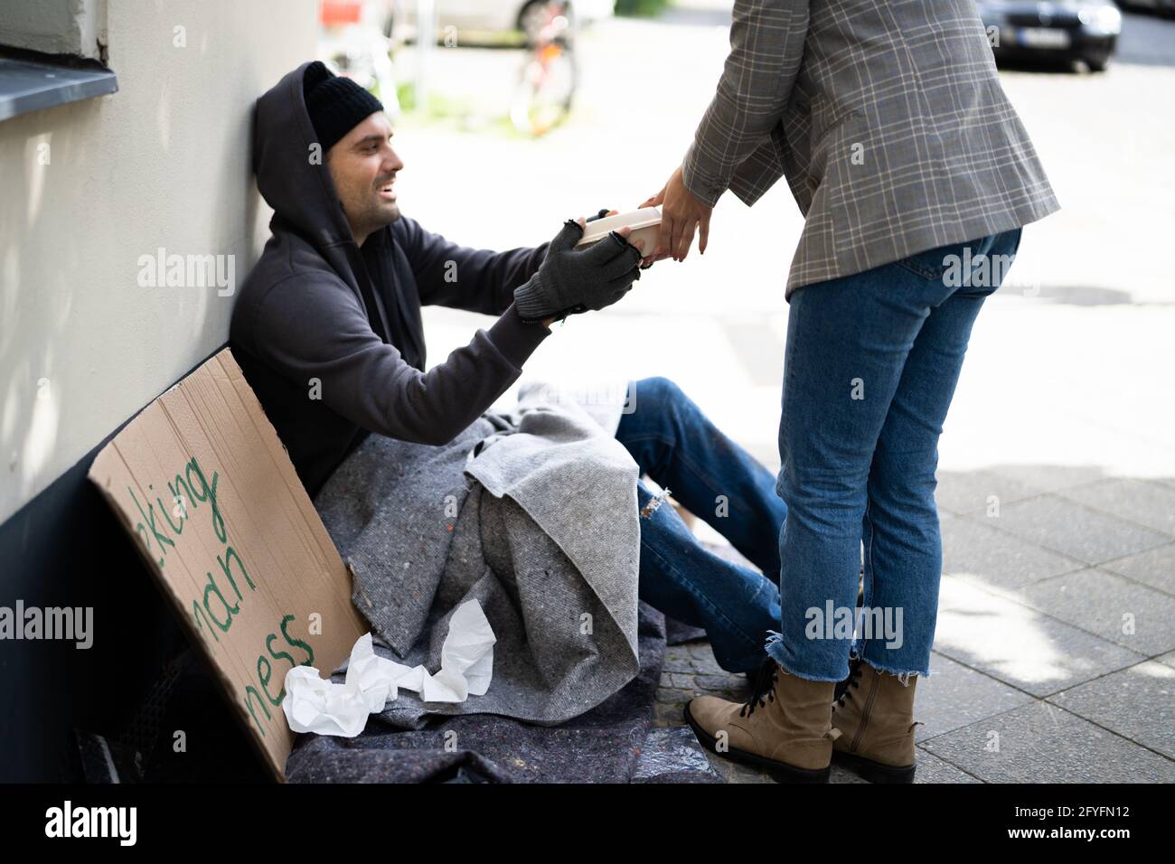 Homeless Food Help. Human Poverty. Poor Man Stock Photo