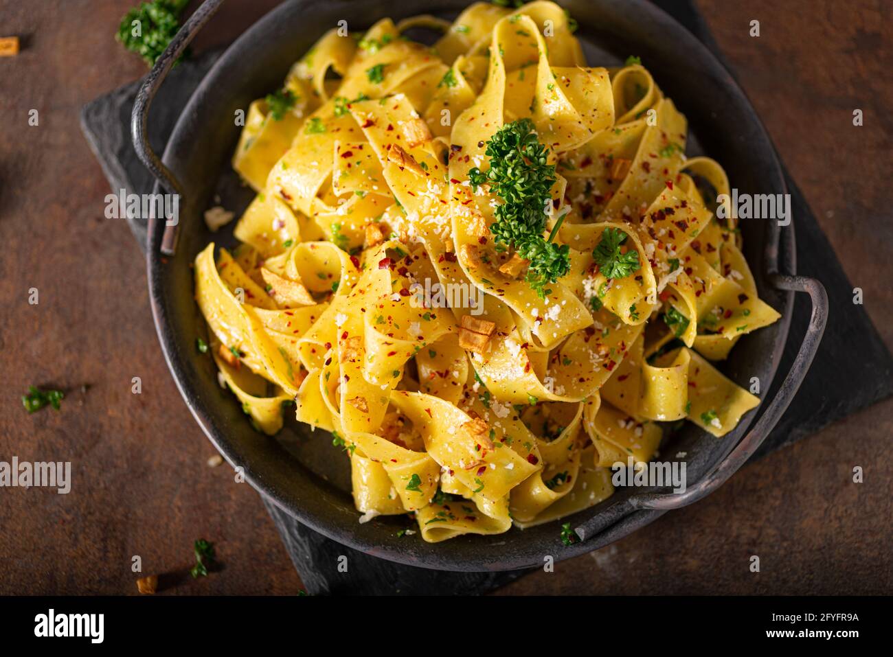 Delicious organic pappardelle with roasted garlic and chilli flakes