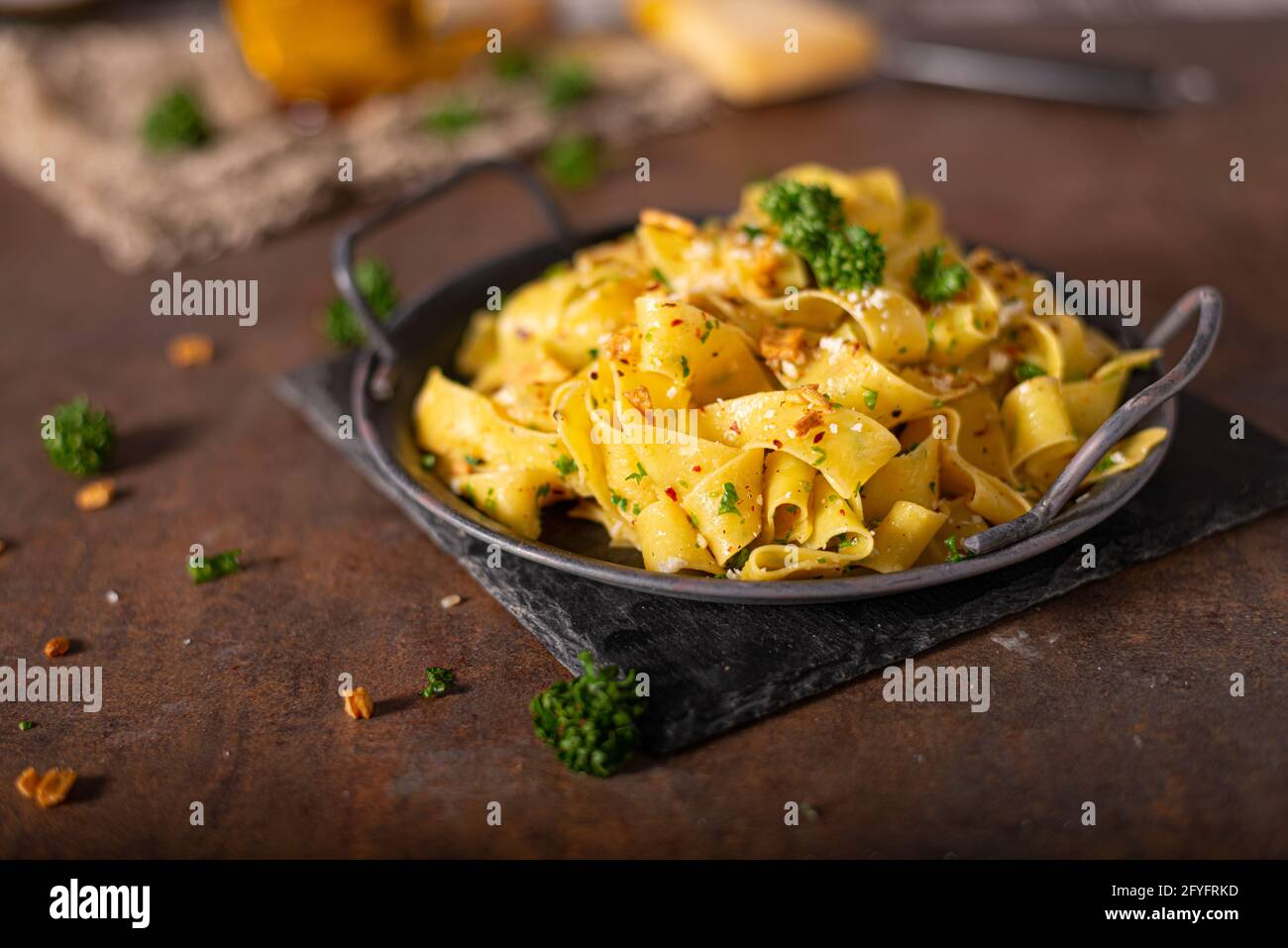 Delicious organic pappardelle with roasted garlic and chilli flakes