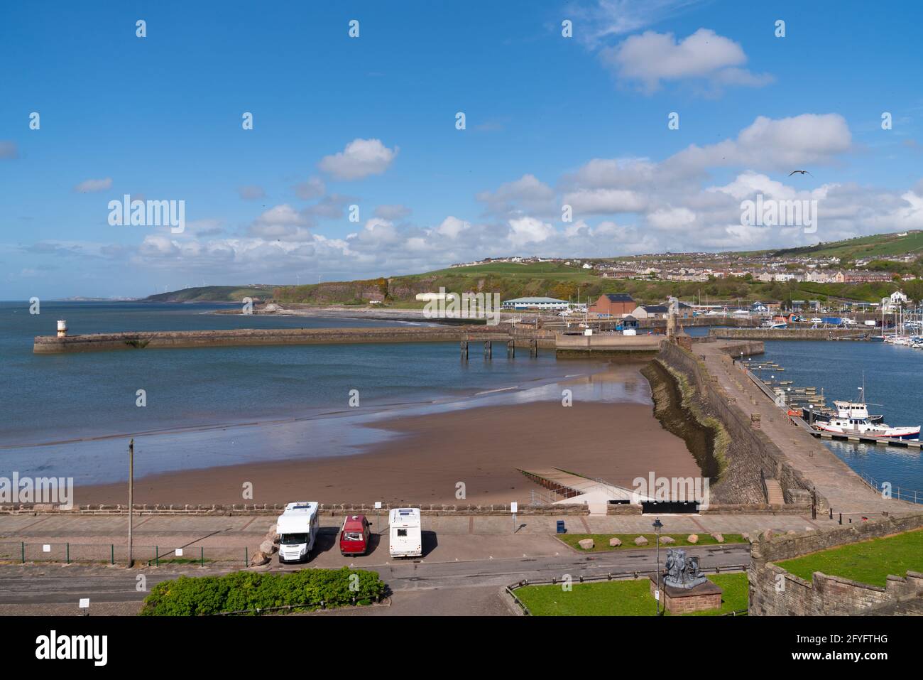 Whitehaven Cumbria harbour wall with motorhomes and campervan parked