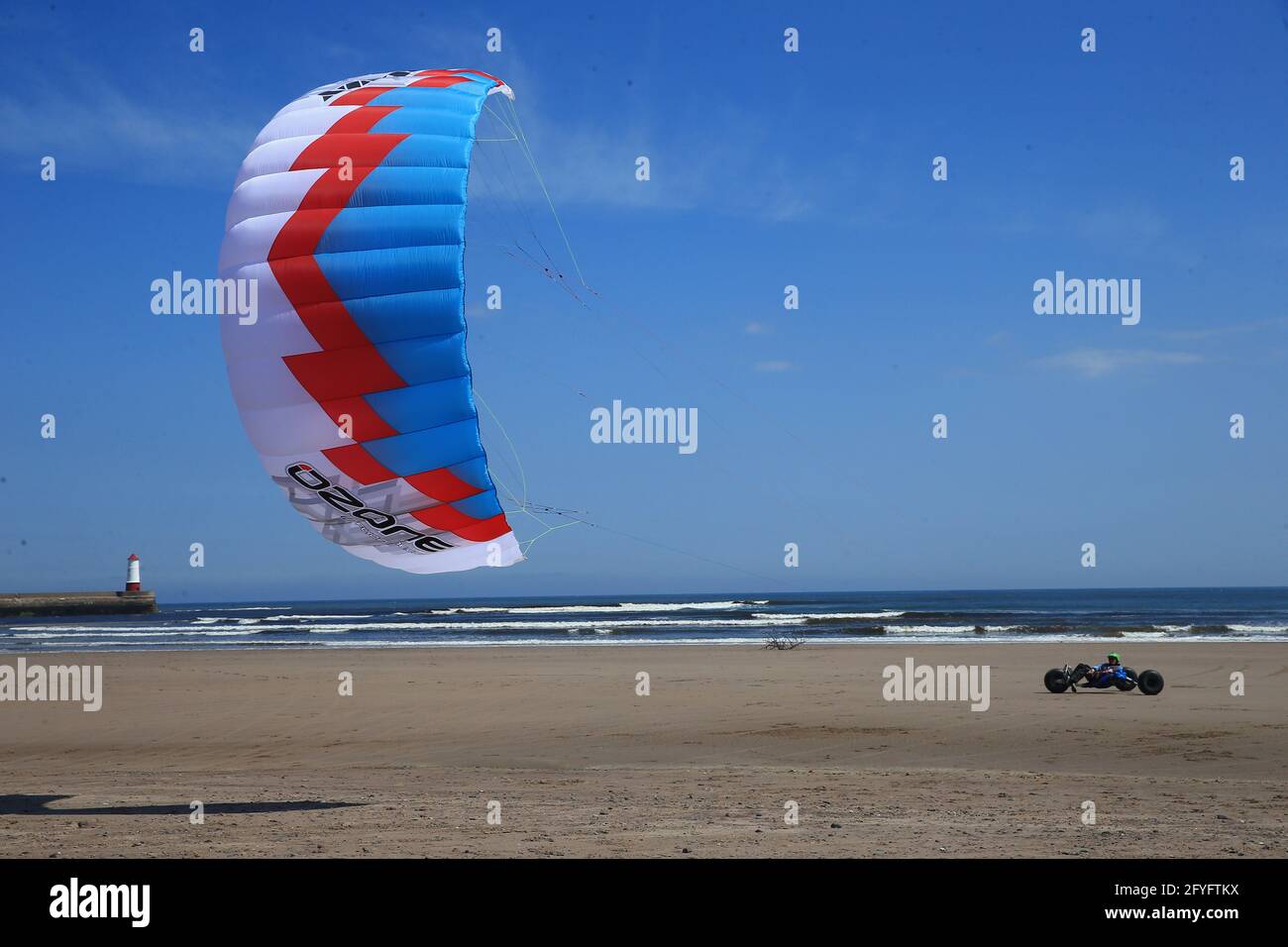 Berwick upon Tweed, UK, 28th May, 2021. UK Weather. A beautiful warm sunny afternoon for kite buggies on Spittal beach to start the May bank holiday weekend. Northumberland  Credit: Gary Learmonth / Alamy Live News Stock Photo