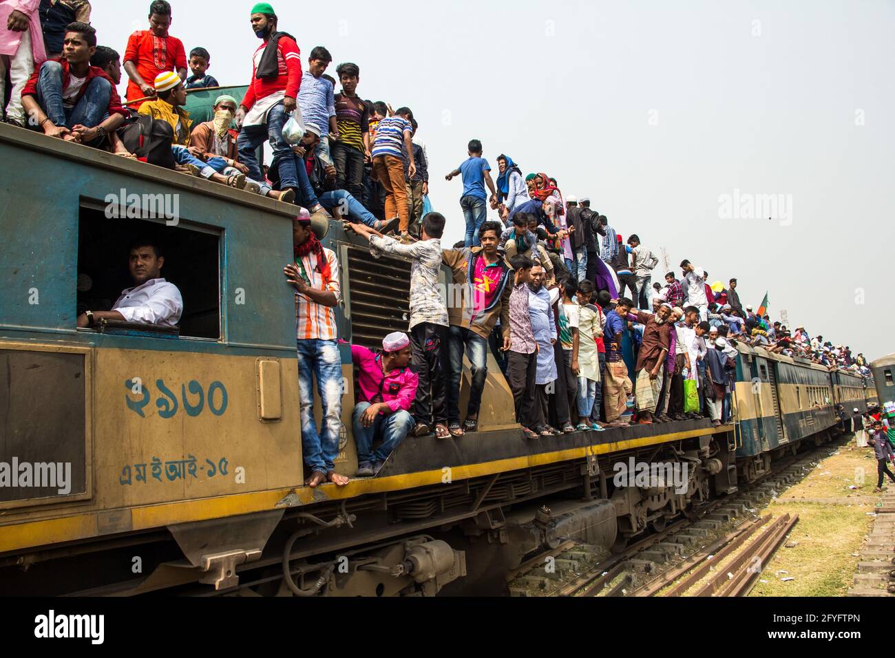 Risky journey by train I captured this image on 19th February 2019 from Tonggi railway station, Dhaka, Bangladesh, South Asia Stock Photo