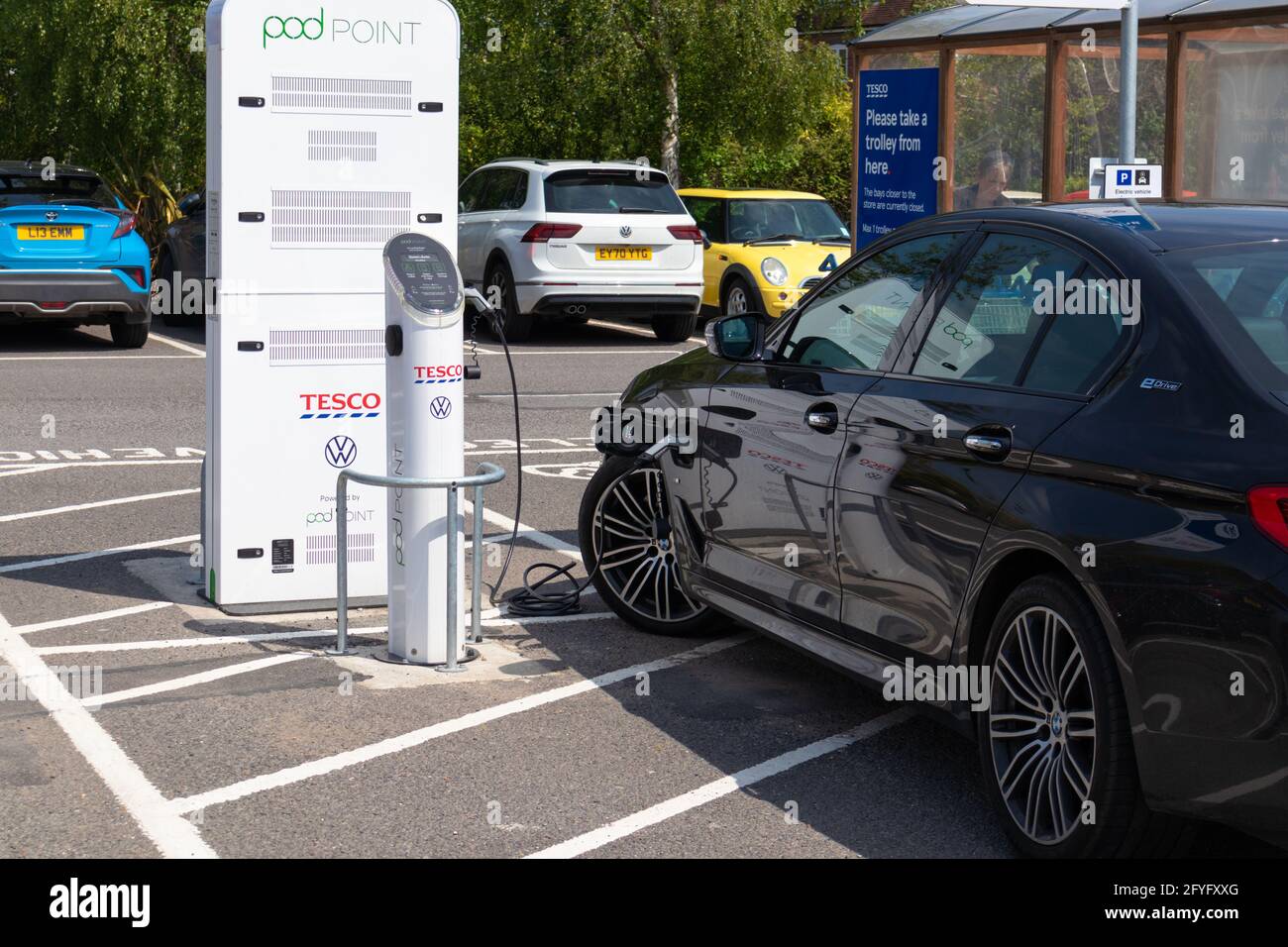 Tesco electric car charging station, powered by pod point, tenterden, kent, uk Stock Photo