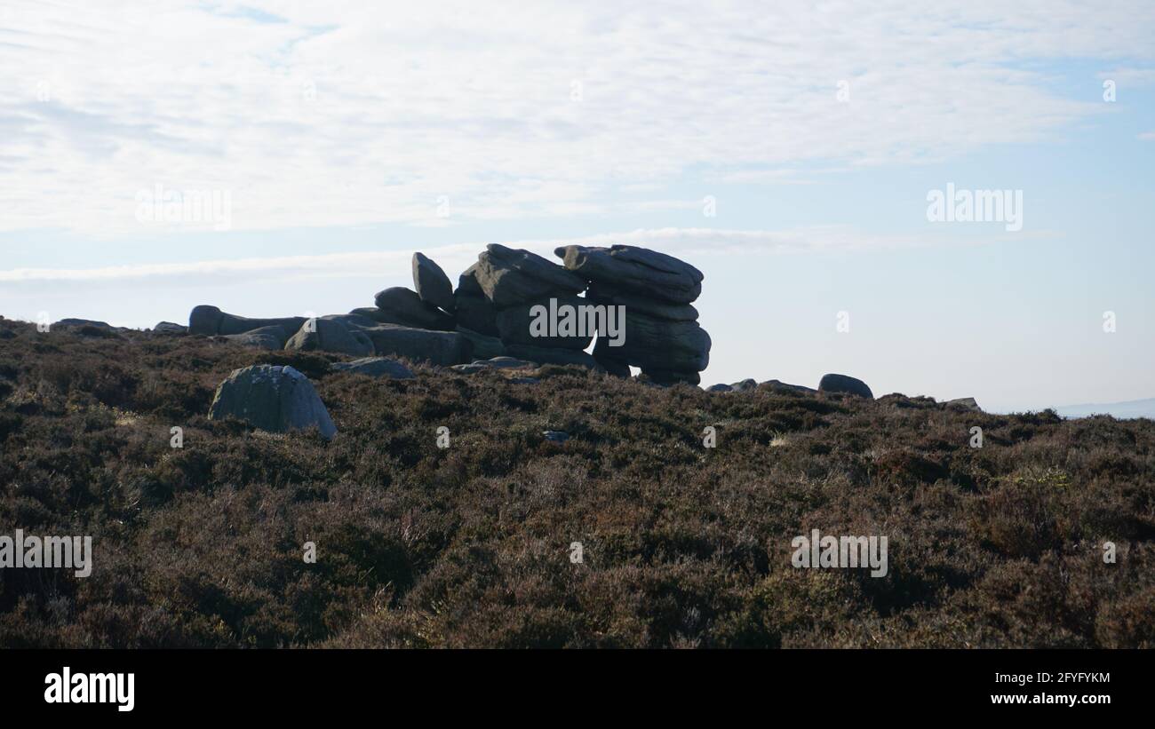 A stack of gritstone boulders on top of Higger Tor, National Peak District, United Kingdom Stock Photo