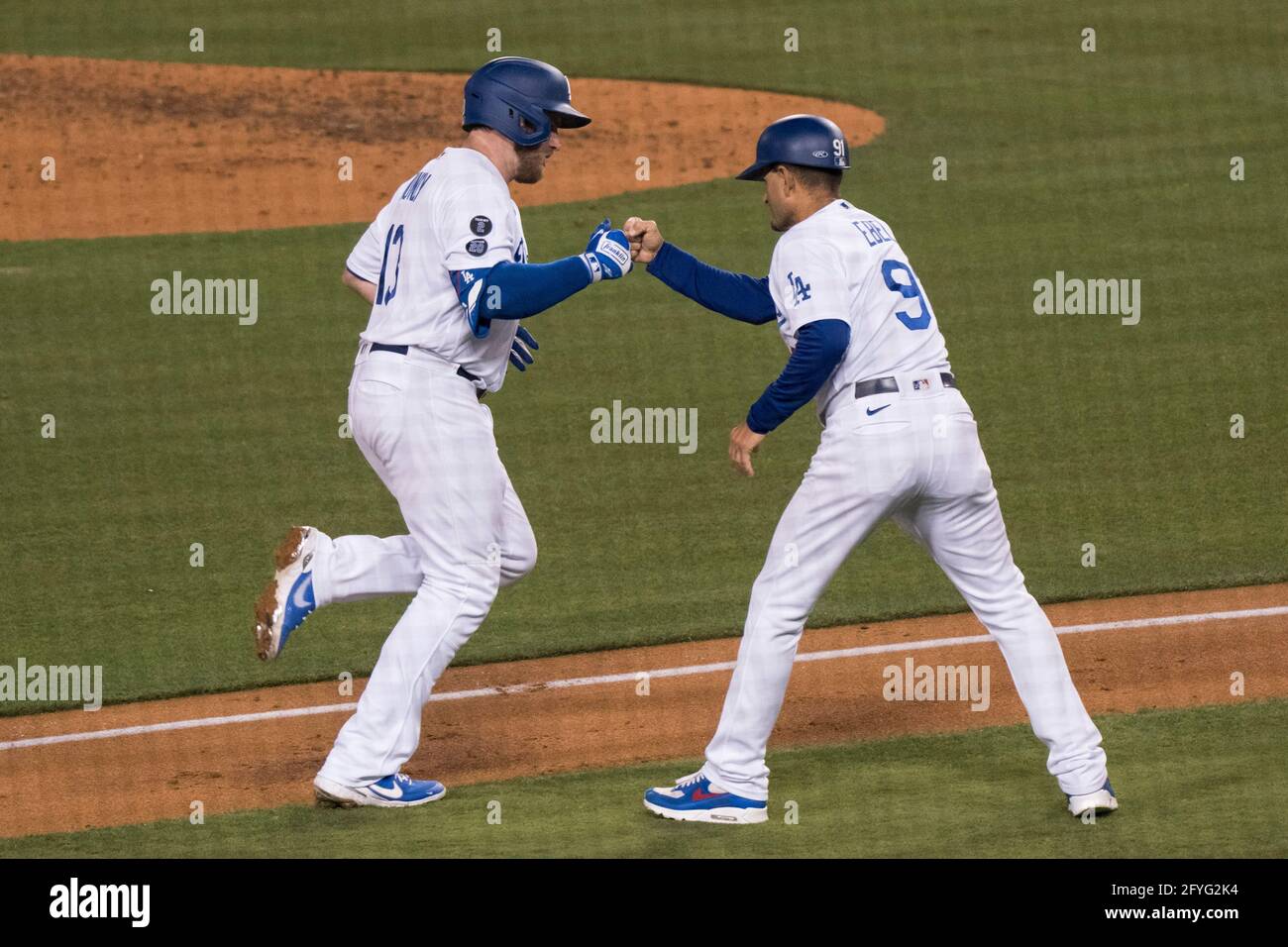 Dino Ebel returns to Dodgers third base coaches box after WBC run