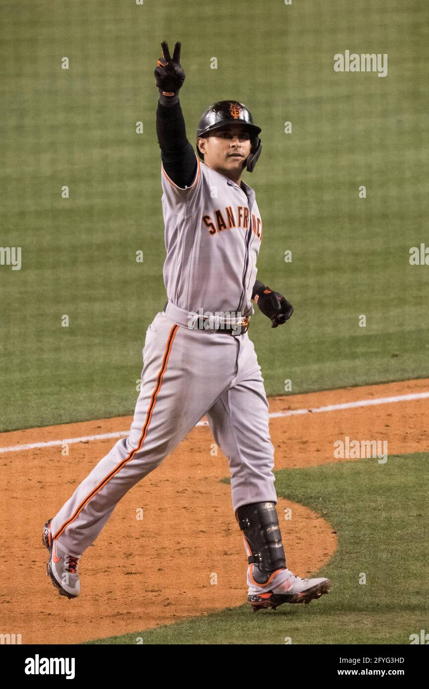 San Francisco Giants shortstop Donovan Solano (7) celebrates after hitting  a two run home run during a MLB game against the Los Angeles Dodgers, Thurs  Stock Photo - Alamy