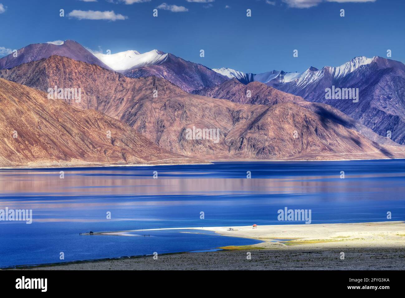 Mountain reflection on Pangong tso (Lake). It is huge lake in United territory of Ladakh,India at Indo China border. Stock Photo