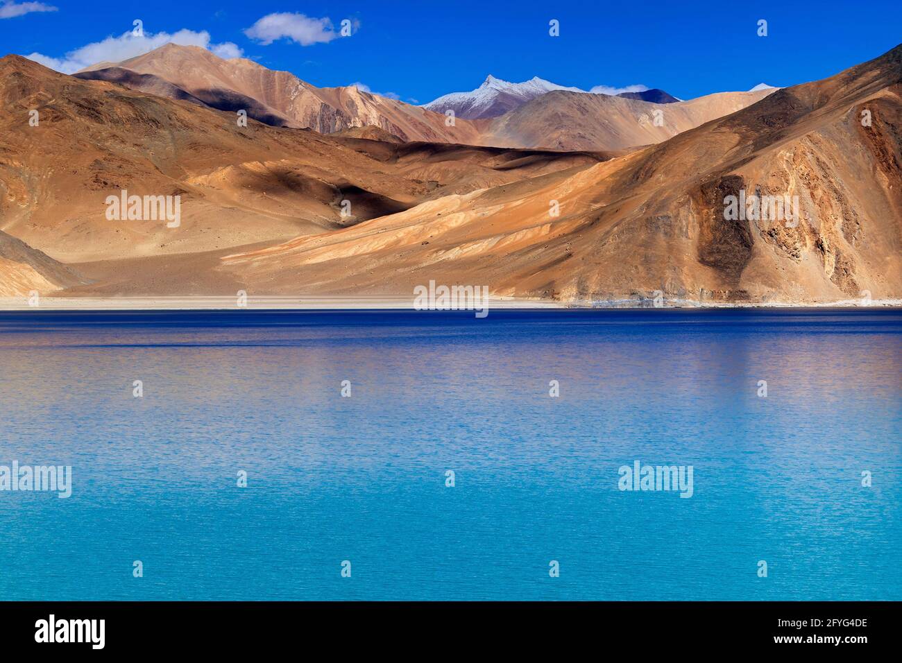 Mountains and Pangong tso (Lake). It is huge lake in united territory of Ladakh, India, at India China border extends to Tibet. Stock Photo