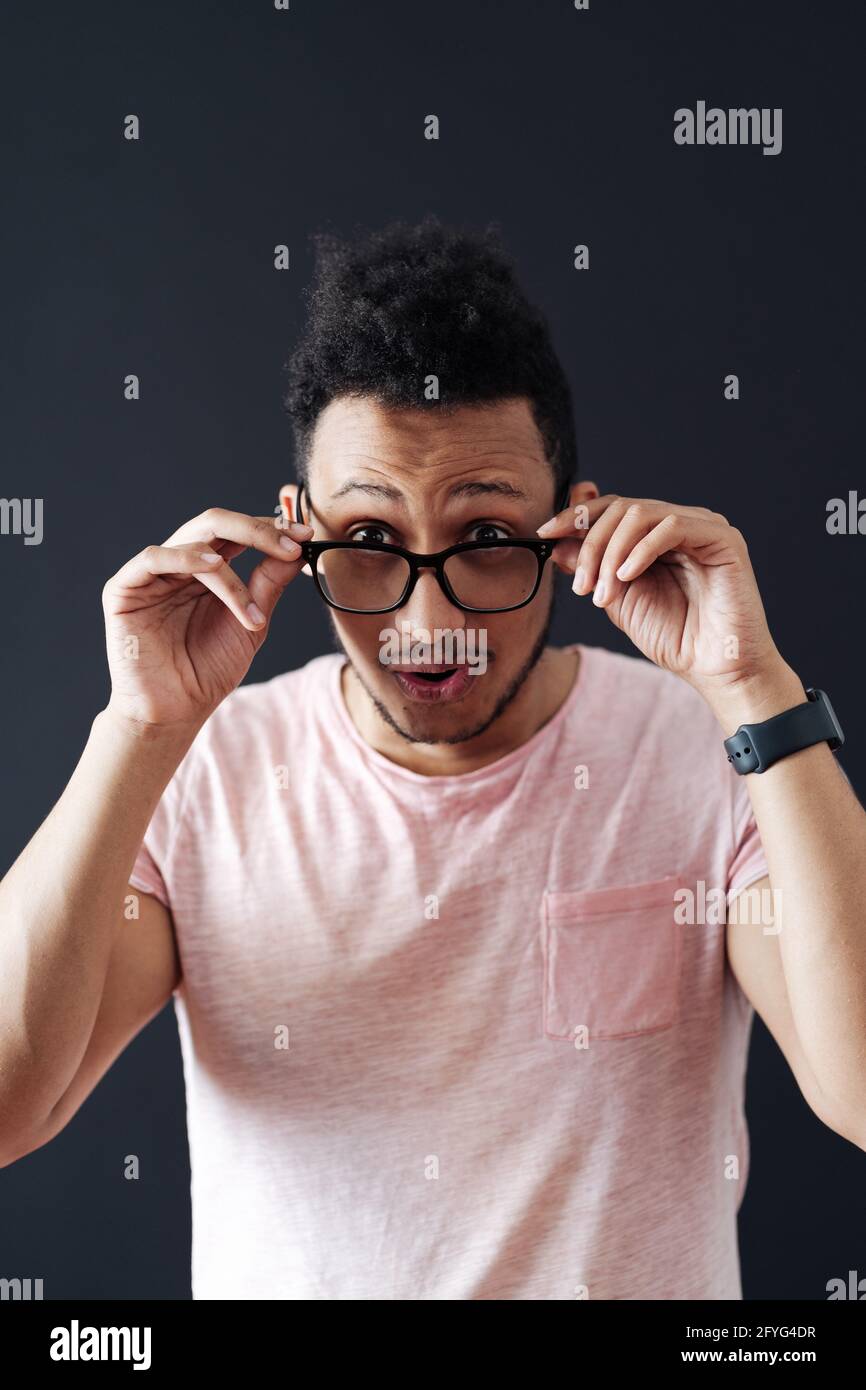 Emotional Attractive Male With Opened Mouth Expresses Great Surprisment And Frighteness Poses Against Black Background Stares At Camera Unexpected Shocking News And Human Reaction Stock Photo Alamy Emotional Attractive Male With Opened Mouth Expresses Great Surprisment And Frighteness Poses Against Black Background Stares At Camera Unexpected Shocking News And Human Reaction Stock Photo Alamy