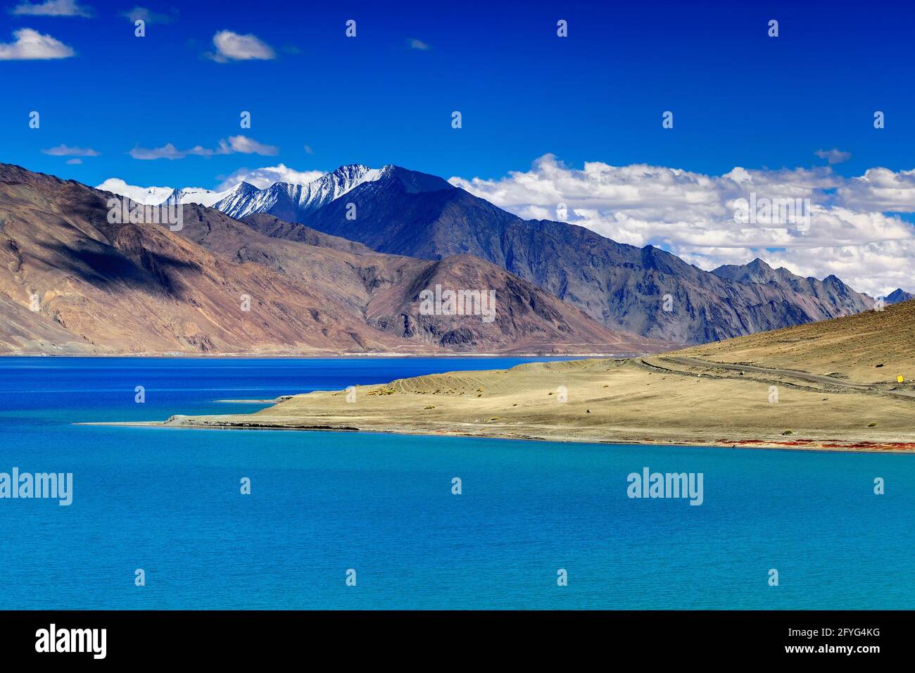 Mountains and Pangong tso (Lake). It is huge lake in united territory of Ladakh, India, at India China border extends Tibet. Stock Photo