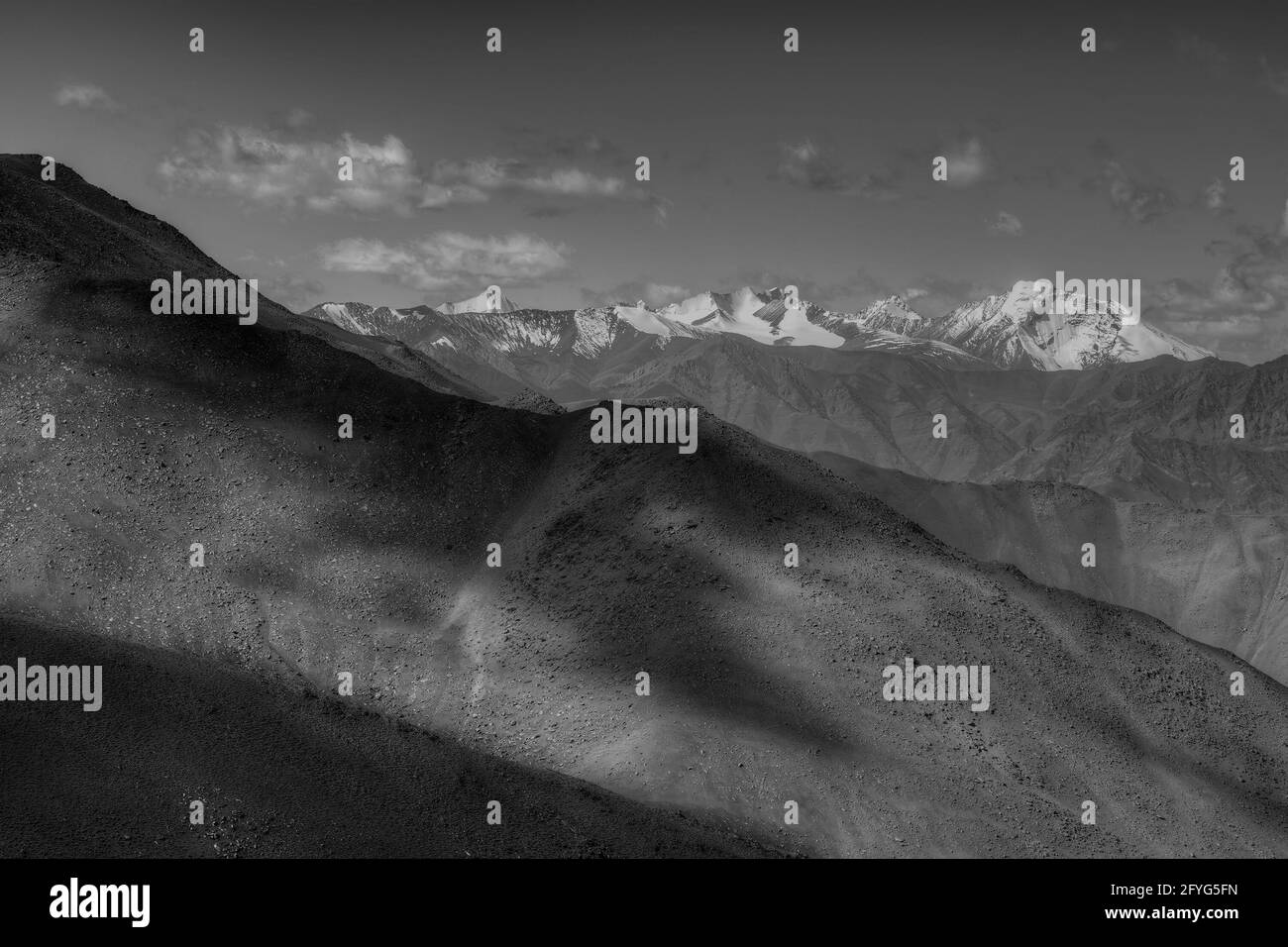 Rocky landscape of Ladakh at Changla pass, play of light and shodow on the mountain, Leh, Ladakh, Jammu and Kashmir, India. Black and white image. Stock Photo