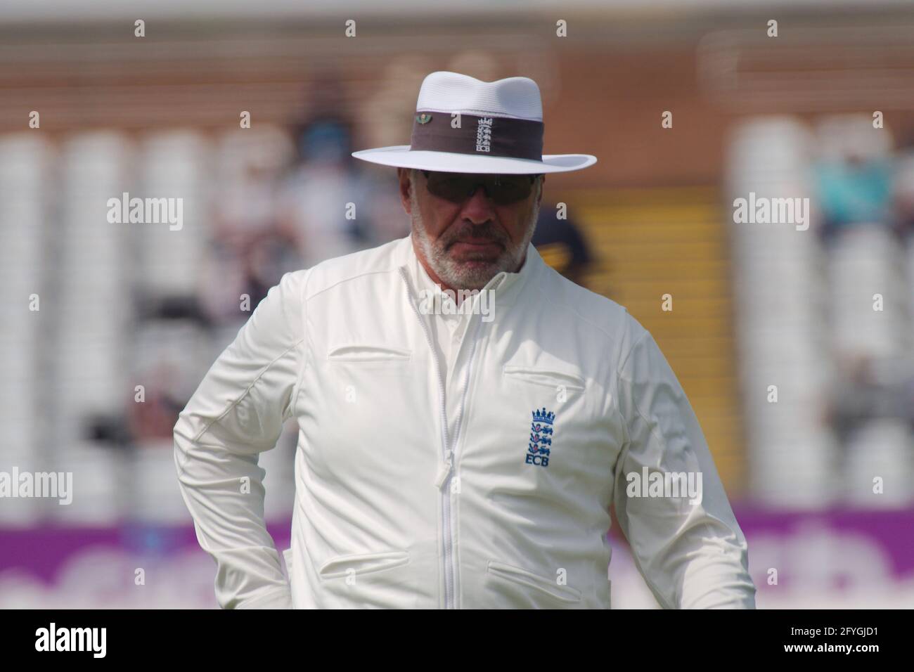 Chester le Street, England, 28 May 2021. James Middlebrook, umpire, standing in the Durham against Essex LV= County Championship match at the Riverside Ground, Chester le Street, Credit: Colin Edwards/Alamy Live News. Stock Photo