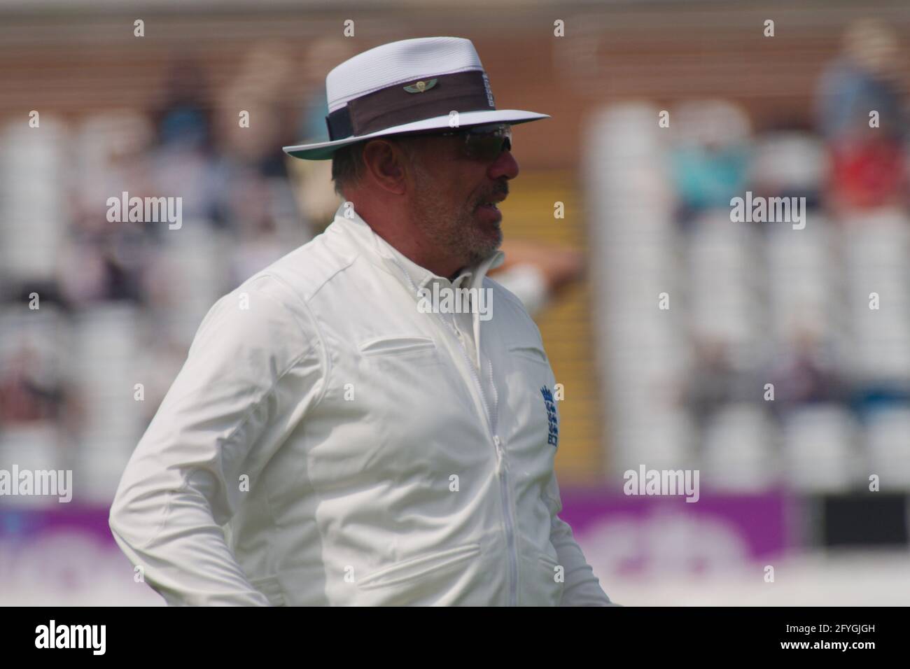 Chester le Street, England, 28 May 2021. James Middlebrook, umpire, standing in the Durham against Essex LV= County Championship match at the Riverside Ground, Chester le Street, Credit: Colin Edwards/Alamy Live News. Stock Photo