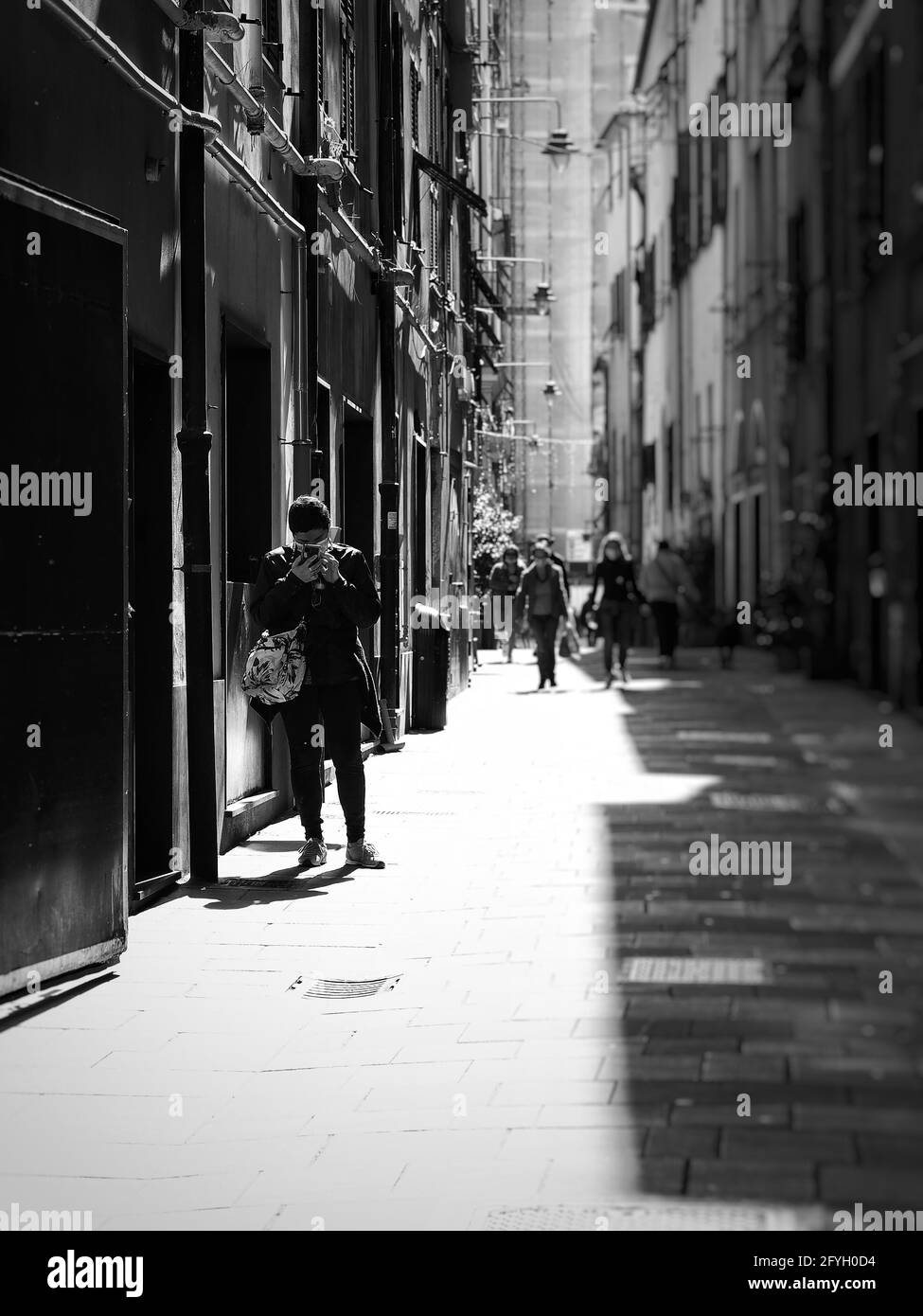 GENOA, ITALY - Apr 17, 2021: a day in the city center, trying to tell and capture a story Stock Photo