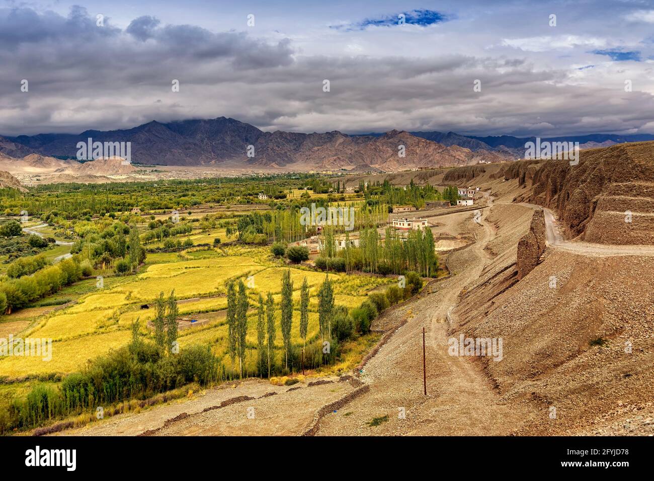 Rocky landscape of Leh City with Himalayan mountains in background , Ladakh, Jammu and Kashmir, India Stock Photo