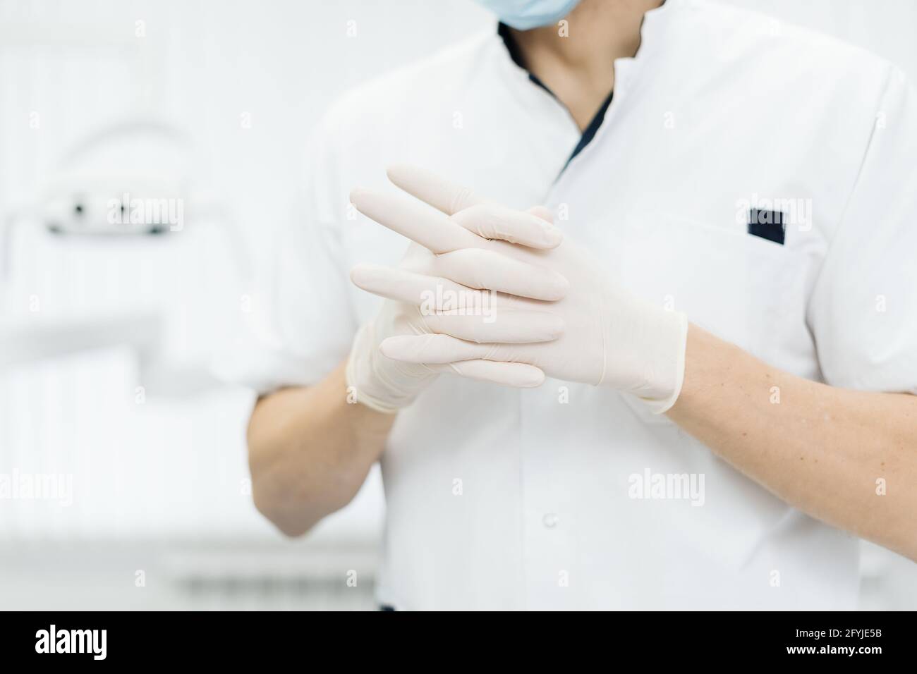 Closeup doctor hands in gloves. Rubber glove manufacturing, human hand