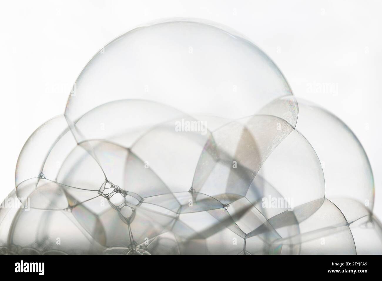 Many soap bubbles piled on white background close up Stock Photo