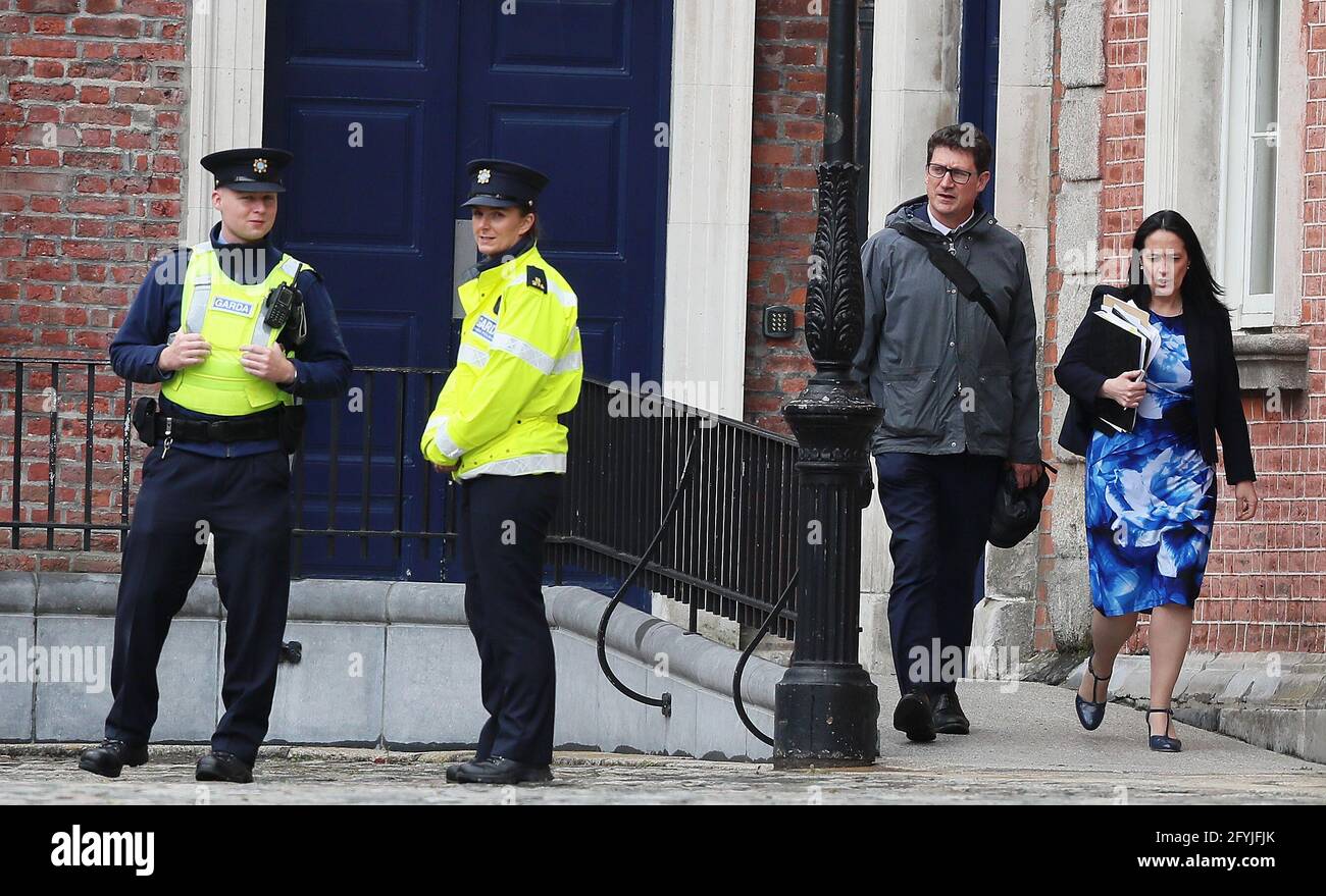 Culture Minister Catherine Martin (right) and Transport Minister Eamon Ryan (second right) leaving Dublin Castle after a Cabinet meeting. Ms. Martin has said pilot live gigs could take place from June across a range of genres from classical music to comedy and theatre while Mr. Ryan said that while there will be a Òsignificant reopeningÓ of society in the next two months, he warned the public to be careful. Taoiseach Micheal Martin is to announce details of plans for further easing of lockdown restrictions later today. Picture date: Friday May 28, 2021. Stock Photo