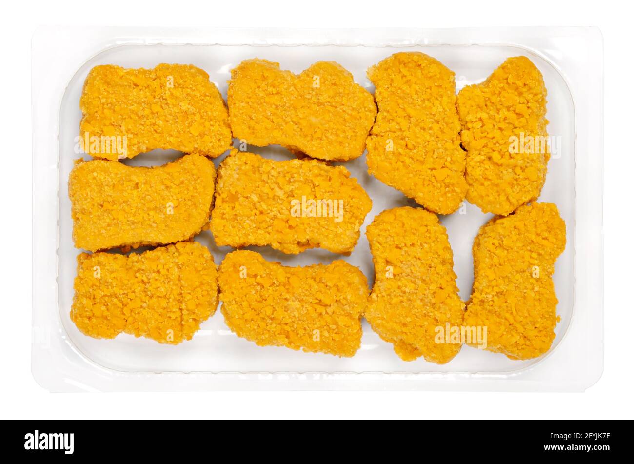 Vegan nuggets, ready to fry in a clear plastic container. Vegan nuggets, based on soy and wheat protein, in crispy breading, pre-fried and cooked. Stock Photo