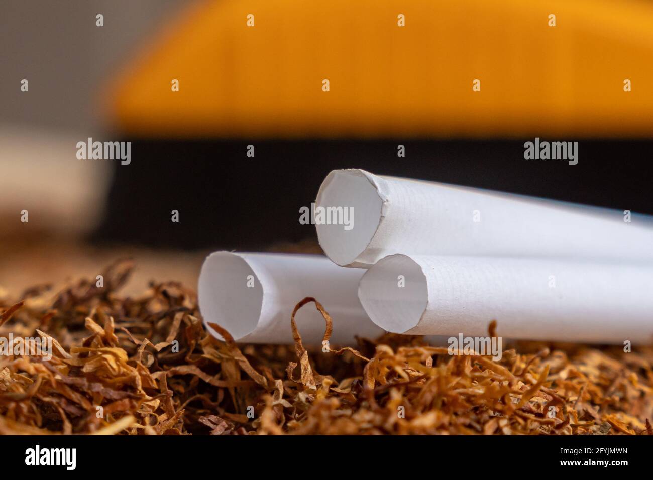 Empty cartridges with a filter for filling with tobacco, cigarettes on