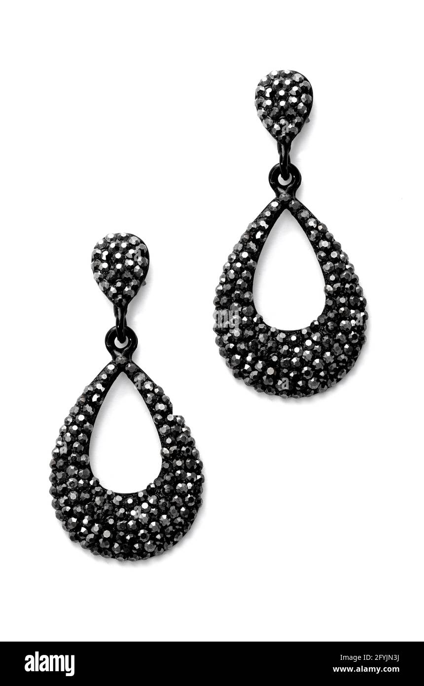 earrings with black gems on a white background Stock Photo