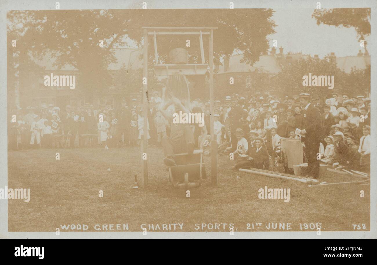 Vintage Edwardian photographic postcard of the Wood Green charity sports event on the 21st June 1906. Stock Photo