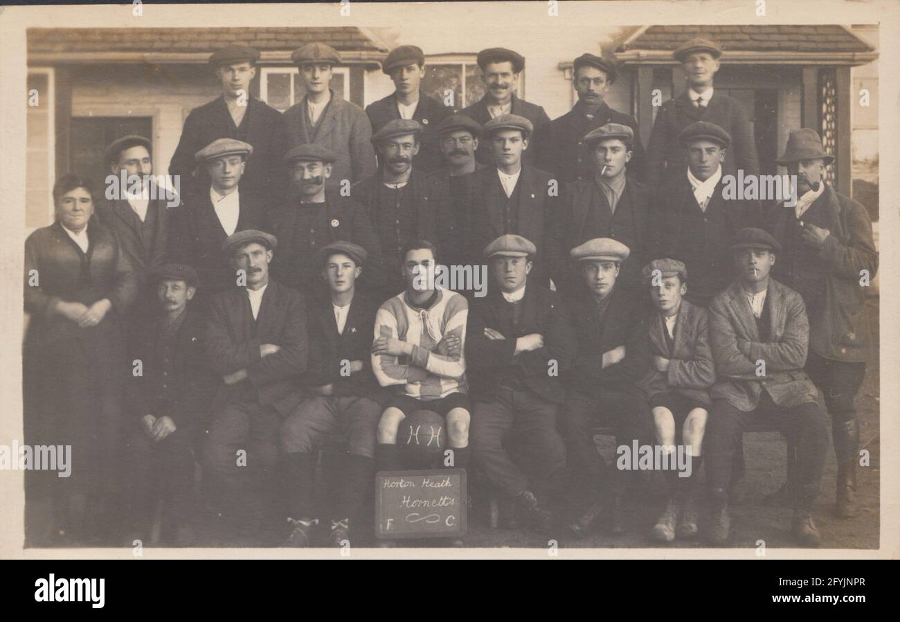 Vintage early 20th century photographic postcard showing the football players of Horton Heath Hornett's. Stock Photo
