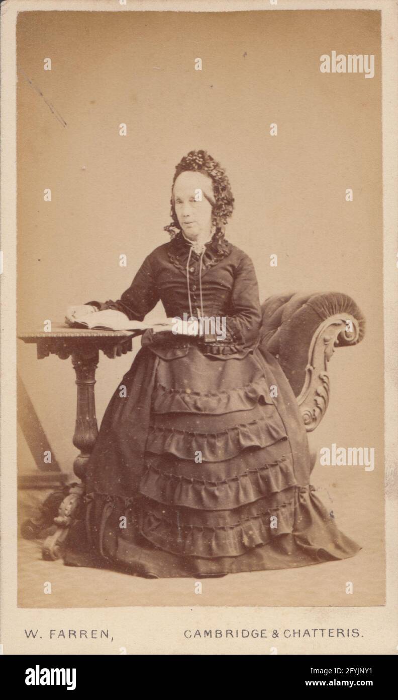 Victorian Cambridgeshire CDV (Carte De Visite) Showing a Seated Lady With a Book. Stock Photo