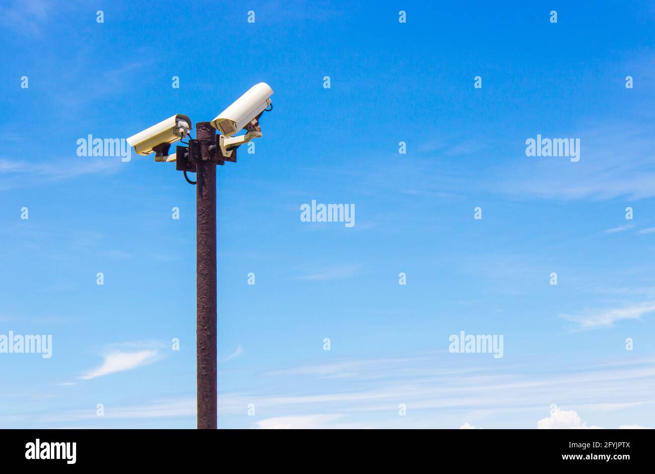 closed circuit camera on the sky background Stock Photo