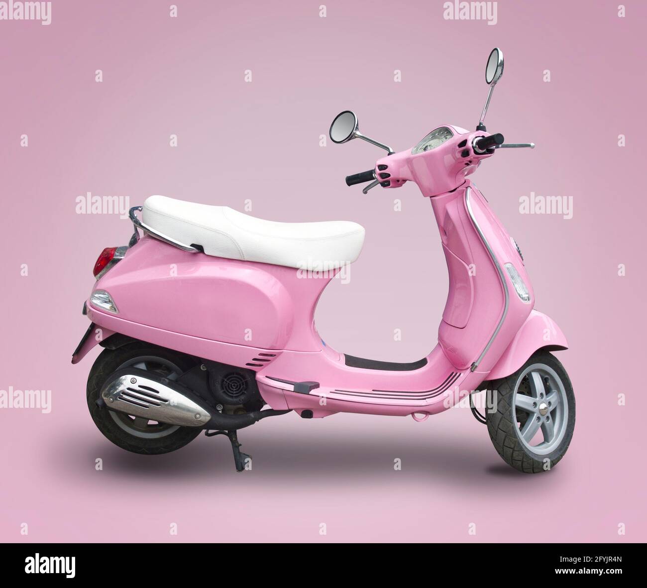 Pink Vespa isolated on pink background Stock Photo - Alamy