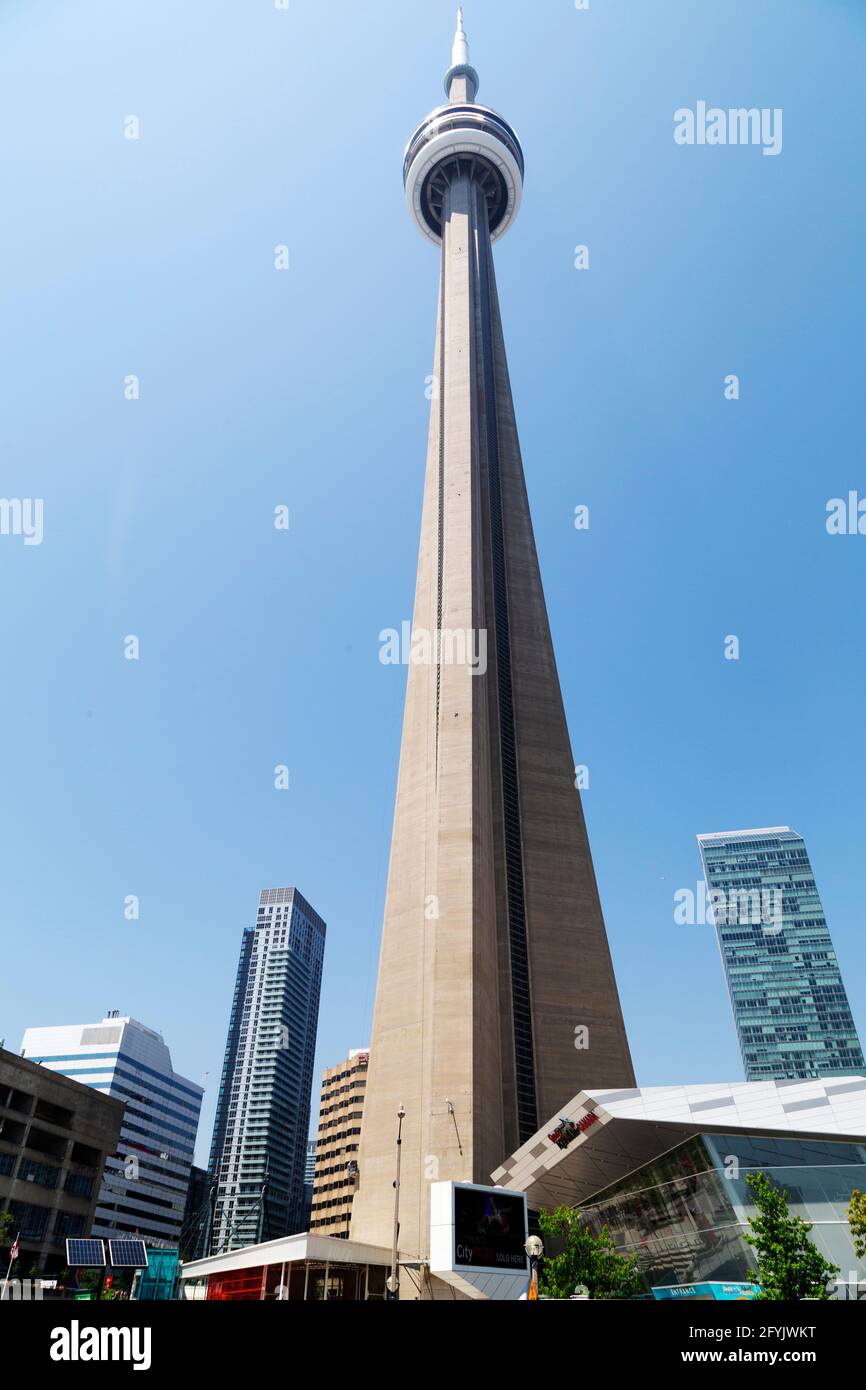 The CN Tower in downtown Toronto, Ontario, Canada. The tower's viewing platforms on the LookOut Level and Sky Pod offer views over the city. Stock Photo