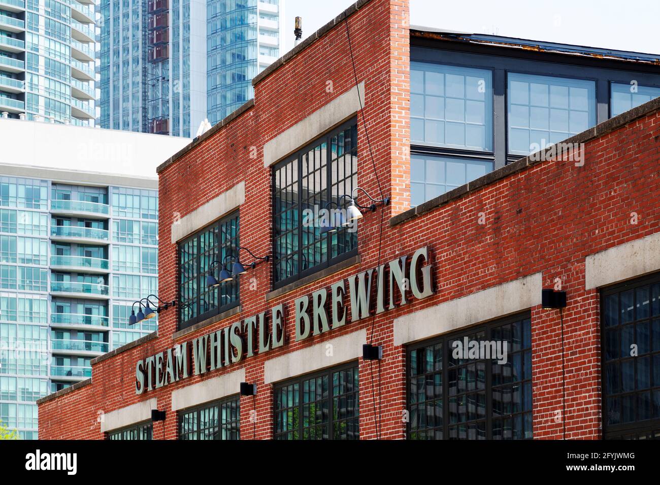 Facade of Steam Whistle Brewing in Toronto, Ontario, Canada. The craft brewery is at the Roundhouse in downtown Toronto. Stock Photo