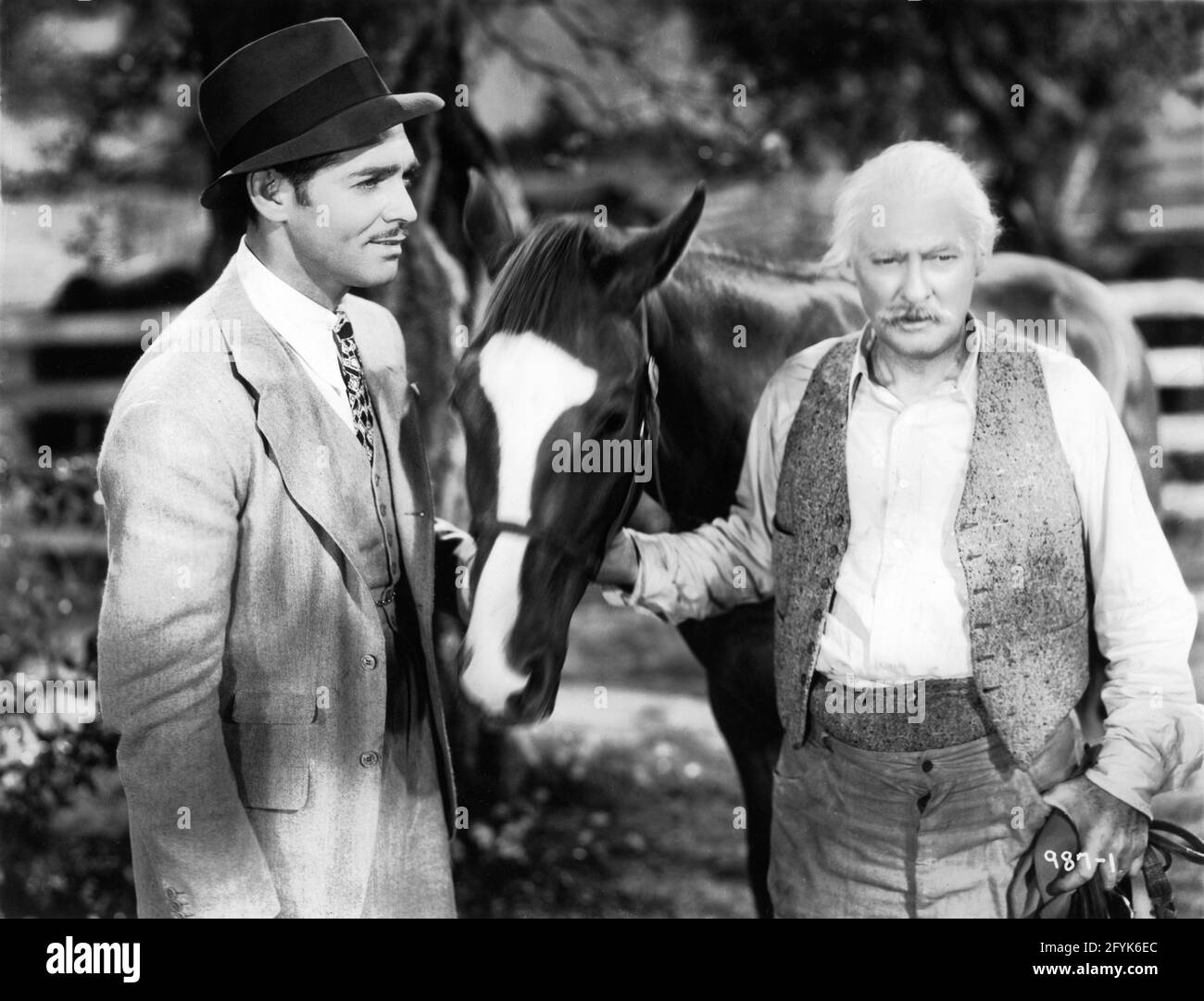 CLARK GABLE and LIONEL BARRYMORE in SARATOGA 1937 director JACK CONWAY original story and screenplay Anita Loos and Robert E. Hopkins Metro Goldwyn Mayer Stock Photo