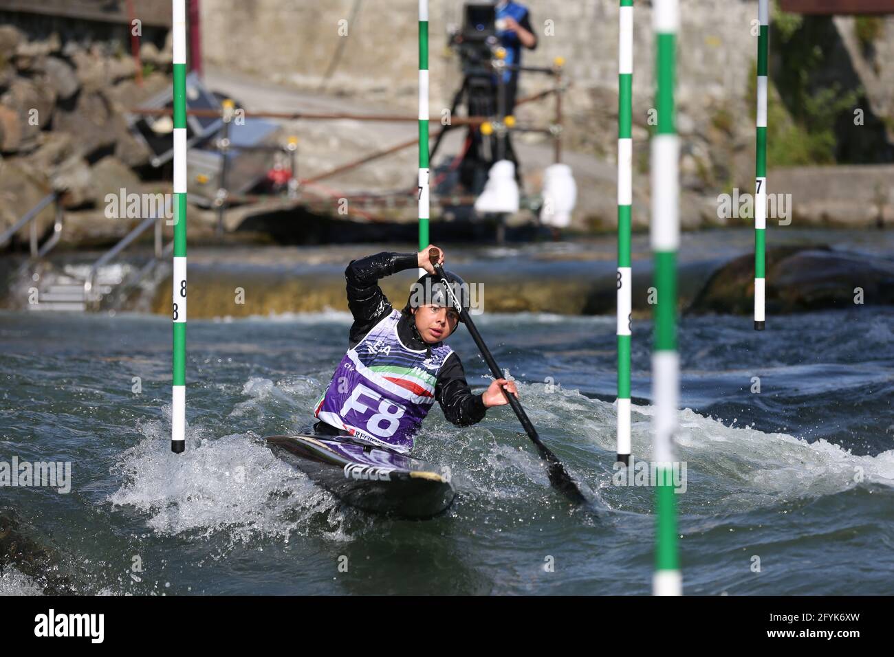 A forerunner ahead of the Women's Canoe (C1) semifinals during the ECA European Championships on the Dora Baltea river on May 9th 2021 in Ivrea, Italy Stock Photo