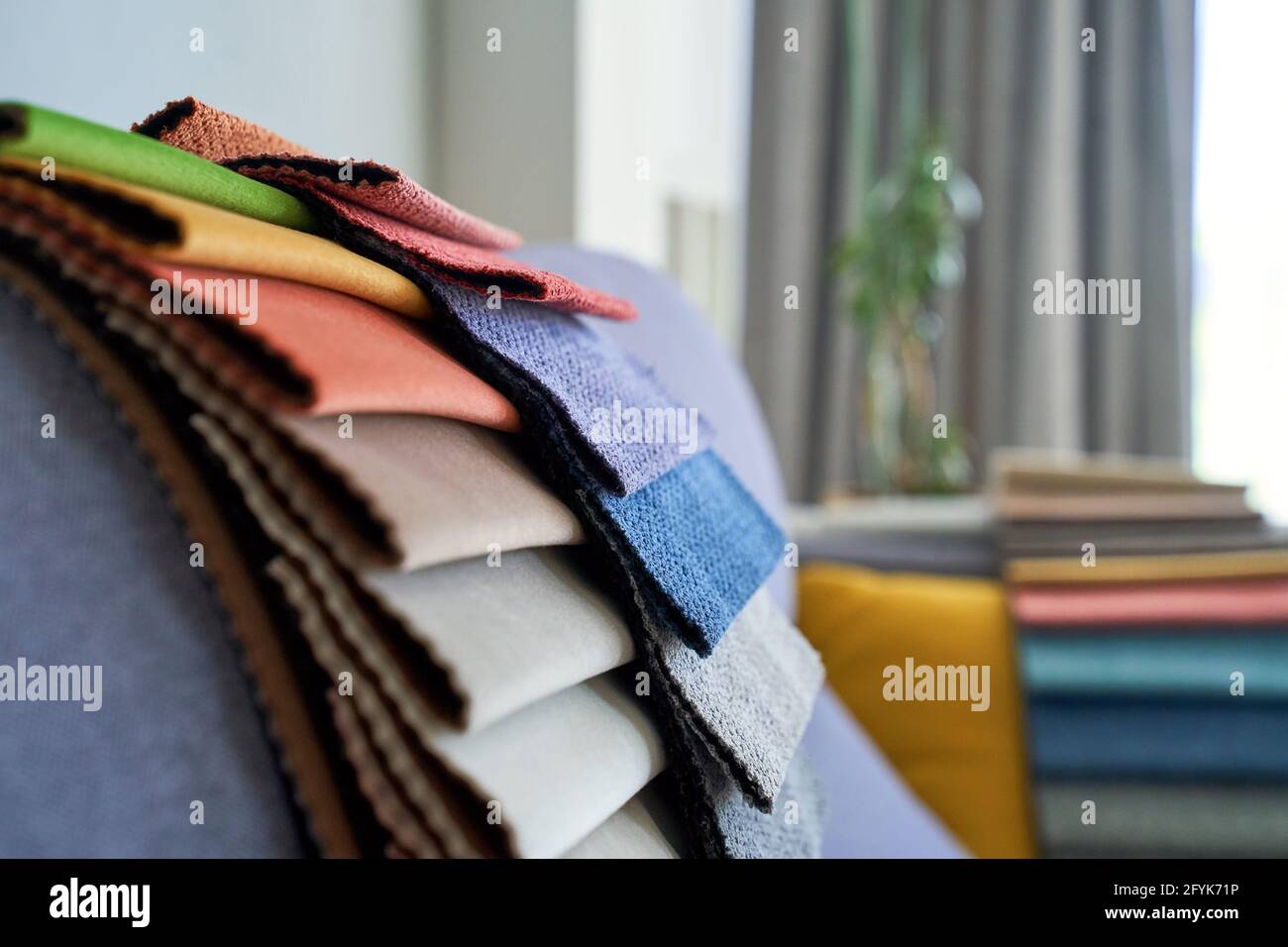 Colorful upholstery fabric samples on the sofa Stock Photo Alamy