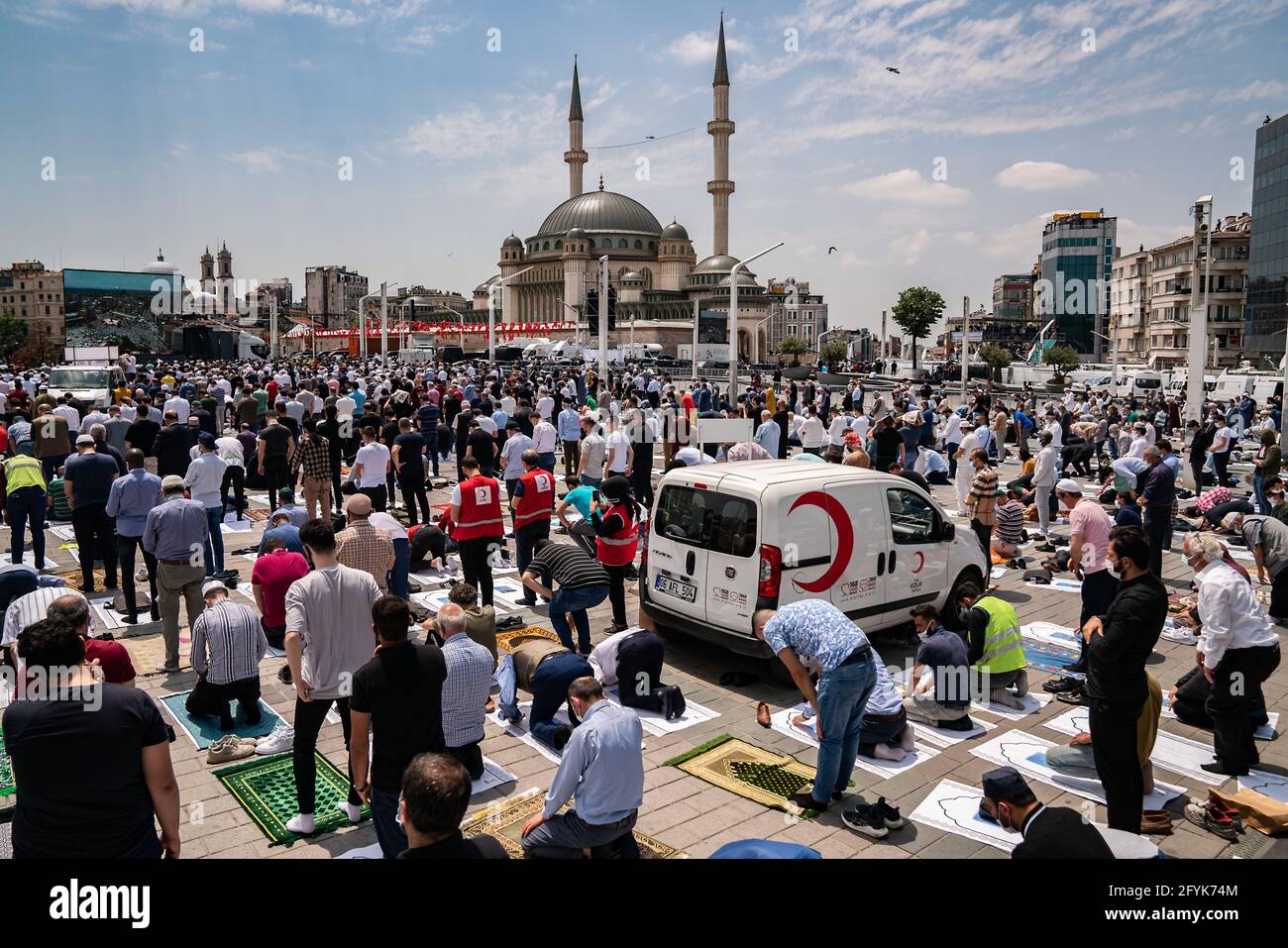 Istanbul, Turkey. 28th May, 2021. People attend the Friday prayers outside the Taksim Mosque. Turkish President Recep Tayyip Erdogan inaugurated the newly built Taksim Mosque in Istanbul's main square. Credit: SOPA Images Limited/Alamy Live News Stock Photo