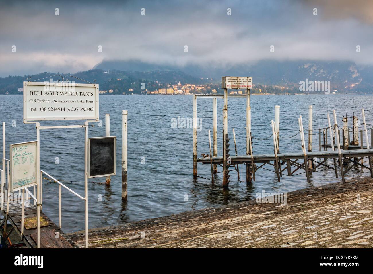 Jetty for Bellagio Water Taxis offering lake tours at Bellagio on Lake Como. Stock Photo
