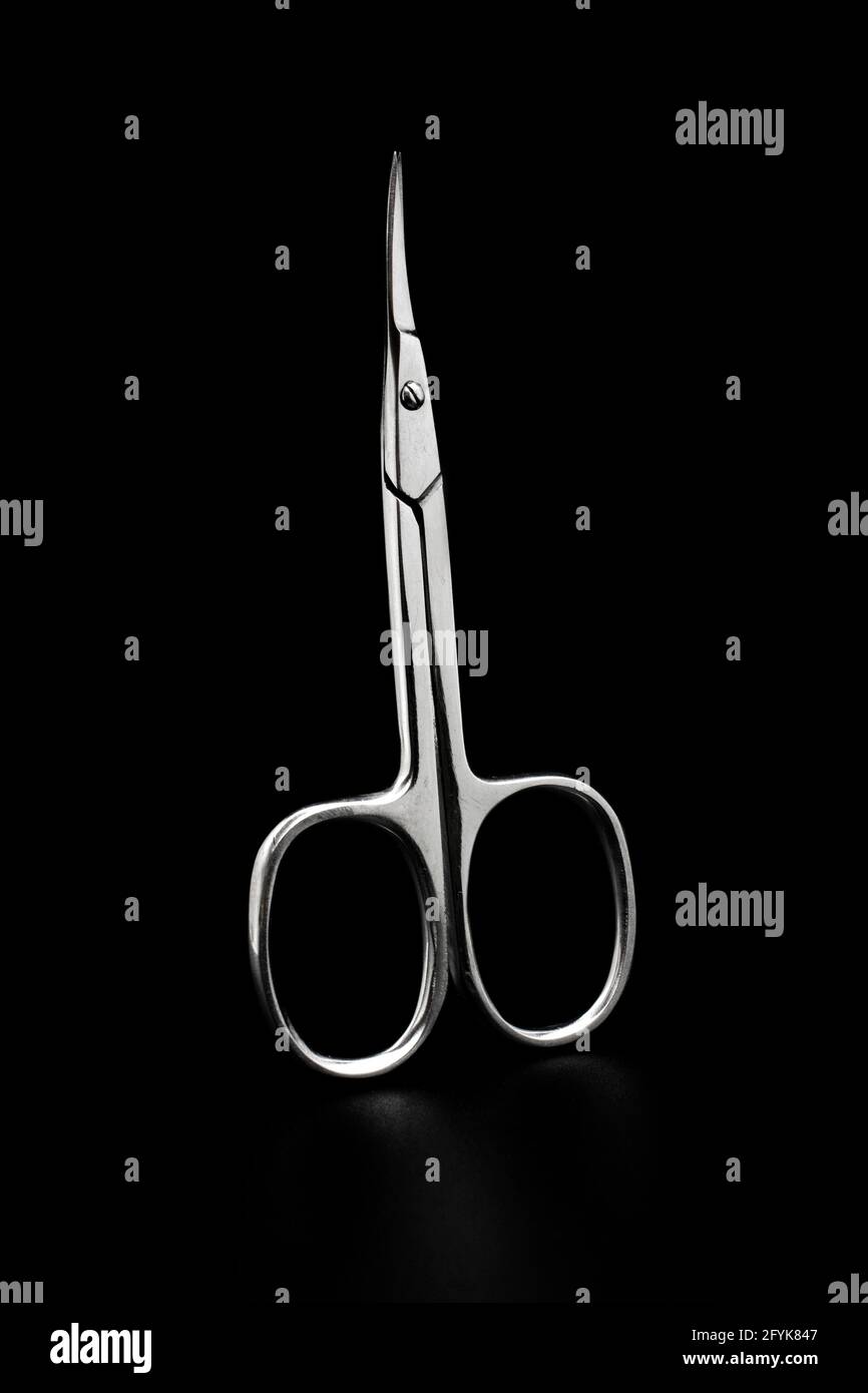 metal manicure scissors isolated on black Stock Photo